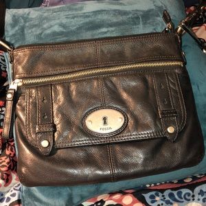 Large black leather Fossil crossbody bag.